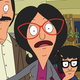 The Belcher family looking into a fisheye lens.